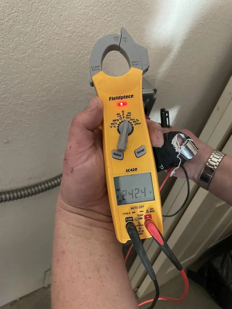 Voltage testing with clamp meter during Generator Installation in Carpinteria